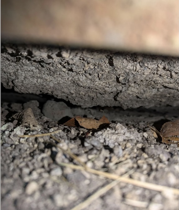 Void under pole barn